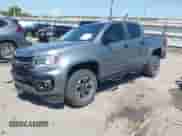 ✅ 2021 Chevrolet Colorado 2WD Z71 • VIN: 1GCGSDEN7M1221860 • Лот: 43174109. Опубликован ранее на IAAI с пробегом 107 061 миль. Бесплатный доступ к архиву аукционных продаж из США и подробный отчёт об истории автомобиля на DreamBid. Изображение 2.