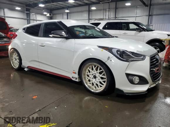 2016 Hyundai Veloster Turbo z VIN KMHTC6AE8GU265894, wystawiony jako Copart lot #85660694 z przebiegiem 117 445 mil mil oraz Szkoda całkowita • Salvage title. Historia ofert i sprzedaży dostępna na DreamBid. Obrazek 4.