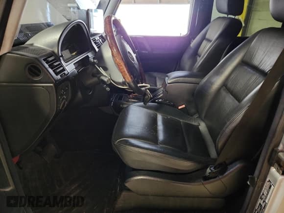 ✅ 2003 Mercedes-Benz G 500 • VIN: WDCYR49E13X142636 • Lot: 63864025. Wystawiony na Copart z przebiegiem 147 520 mil. Bezpłatny archiwum sprzedaży aukcyjnych z USA i szczegółowy raport historii pojazdu na DreamBid. Zdjęcie 7.