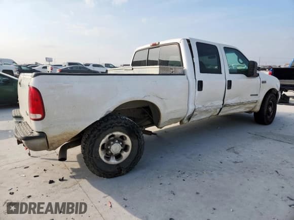 ✅ 2002 Ford F-250 XL • VIN: 1FTNW20F82EA21737 • Лот: 93669585. Опубликован ранее на Copart с пробегом 241 098 миль. Бесплатный доступ к архиву аукционных продаж из США и подробный отчёт об истории автомобиля на DreamBid. Изображение 3.