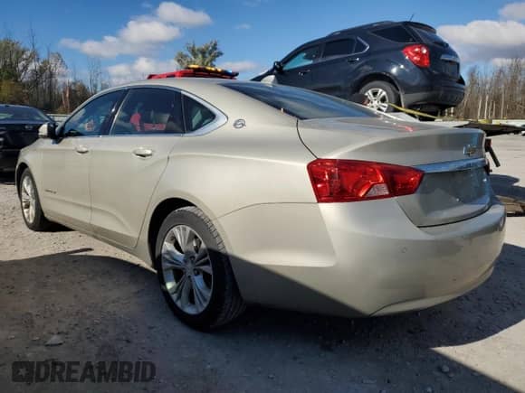 2014 Chevrolet Impala LT with VIN 2G1125S32E9300650, listed as a Copart auction lot 90485325 with 166,657 mi miles and Salvage title. Bid and sale history available at DreamBid. Image 2.