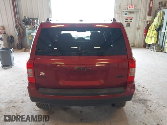 ✅ 2014 Jeep Patriot Latitude • VIN: 1C4NJRFB1ED713506 • Lot: 42176696. Listed on IAAI with 118,509 mi. Free auction sales archive from the USA and detailed vehicle history report at DreamBid. Image 16.