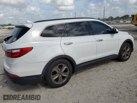 ✅ 2014 Hyundai Santa Fe GLS • VIN: KM8SN4HF7EU069497 • Лот: 63117704. Опубликован ранее на Copart с пробегом 192 308 миль. Бесплатный доступ к архиву аукционных продаж из США и подробный отчёт об истории автомобиля на DreamBid. Изображение 3.