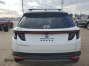 ✅ 2022 Hyundai Tucson Limited • VIN: 5NMJE3AE7NH125974 • Lot: 76609244. Wystawiony na Copart z przebiegiem 19 091 mil. Bezpłatny archiwum sprzedaży aukcyjnych z USA i szczegółowy raport historii pojazdu na DreamBid. Zdjęcie 6.