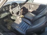 ✅ 1986 Porsche 911 • VIN: WP0EB0917GS161455 • Lot: 74672764. Wystawiony na Copart z przebiegiem 80 076 mil. Bezpłatny archiwum sprzedaży aukcyjnych z USA i szczegółowy raport historii pojazdu na DreamBid. Zdjęcie 7.