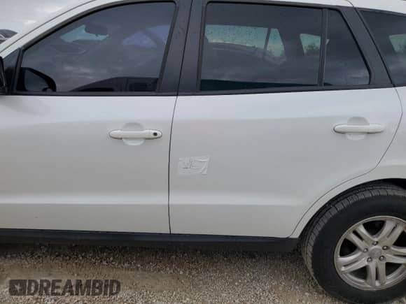 2012 Hyundai Santa Fe GLS with VIN 5XYZG3ABXCG113666, listed as a Copart auction lot 74131604 with 121,303 mi miles and Salvage title. Bid and sale history available at DreamBid. Image 13.