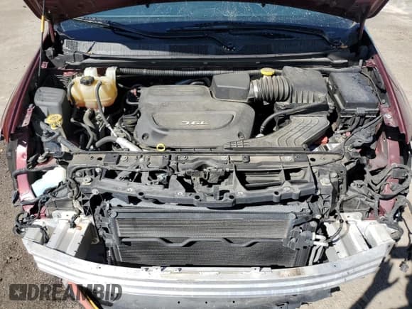 ✅ 2018 Chrysler Pacifica Limited • VIN: 2C4RC1GG3JR141353 • Lot: 86873185. Listed on Copart with 134,815 mi. Free auction sales archive from the USA and detailed vehicle history report at DreamBid. Image 12.