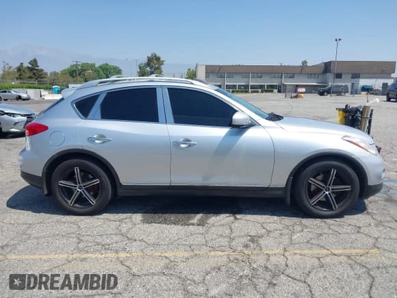 ✅ 2010 Infiniti EX • VIN: JN1AJ0HP0AM700469 • Lot: 42803866. Listed on IAAI with 105,292 mi. Free auction sales archive from the USA and detailed vehicle history report at DreamBid. Image 13.