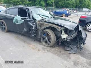 2012 Dodge Charger SXT Plus z VIN 2C3CDXHG5CH225305, wystawiony jako IAAI lot #42386572 z przebiegiem 124 804 mil mil oraz . Historia ofert i sprzedaży dostępna na DreamBid. Obrazek 1.