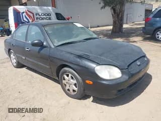 ✅ 2001 Hyundai Sonata GLS • VIN: KMHWF35V31A458928 • Lot: 41944264. Listed on IAAI with 118,398 mi. Free auction sales archive from the USA and detailed vehicle history report at DreamBid. Image 1.