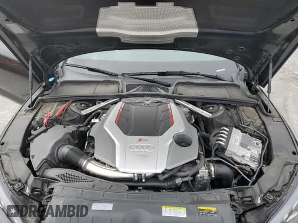 ✅ 2021 Audi RS 5 Sportback • VIN: WUAAWCF53MA904838 • Лот: 56450664. Опубликован ранее на Copart с пробегом 46 020 миль. Бесплатный доступ к архиву аукционных продаж из США и подробный отчёт об истории автомобиля на DreamBid. Изображение 12.