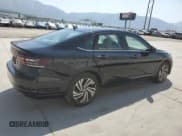 ✅ 2021 Volkswagen Jetta SEL • VIN: 3VWE57BU5MM013374 • Лот: 65150905. Опубликован ранее на Copart с пробегом 50 969 миль. Бесплатный доступ к архиву аукционных продаж из США и подробный отчёт об истории автомобиля на DreamBid. Изображение 3.