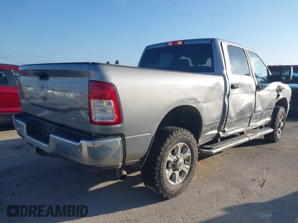 ✅ 2023 Ram 2500 Big Horn • VIN: 3C6UR5DJ5PG539184 • Lot: 43265378. Listed on IAAI with 76,820 mi. Free auction sales archive from the USA and detailed vehicle history report at DreamBid. Image 4.