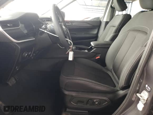 2023 Jeep Grand Cherokee Altitude X with VIN 1C4RJHAGXPC578615, listed as a Copart auction lot 86881694 with 33,853 mi miles and Salvage title. Bid and sale history available at DreamBid. Image 7.