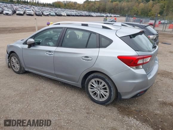 ✅ 2017 Subaru Impreza Premium • VIN: 4S3GTAD63H3711082 • Lot: 43513367. Listed on IAAI with 74,235 mi. Free auction sales archive from the USA and detailed vehicle history report at DreamBid. Image 3.