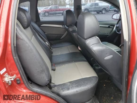 2009 Chevrolet Aveo 2LT z VIN KL1TG66E59B652927, wystawiony jako Copart lot #81853464 z przebiegiem 113 538 mil mil oraz Szkoda całkowita • Salvage title. Historia ofert i sprzedaży dostępna na DreamBid. Obrazek 10.