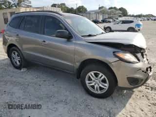 2011 Hyundai Santa Fe GLS z VIN 5XYZGDAB9BG051181, wystawiony jako Copart lot #72565934 z przebiegiem 113 625 mil mil oraz Szkoda całkowita • Salvage title. Historia ofert i sprzedaży dostępna na DreamBid. Obrazek 4.