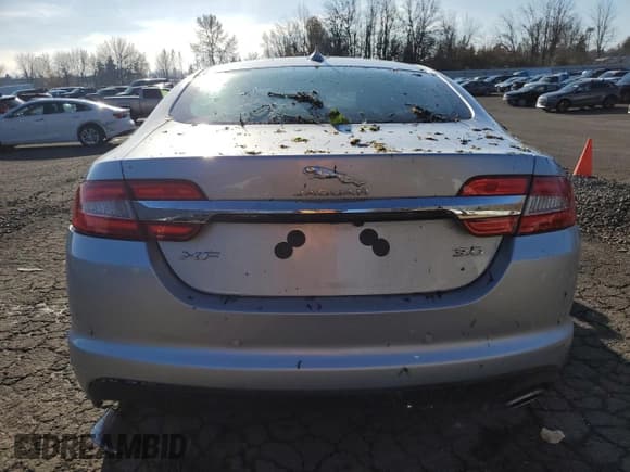 ✅ 2015 Jaguar XF Portfolio • VIN: SAJWA0F7XF8U51105 • Lot: 82865814. Listed on Copart with 62,807 mi. Free auction sales archive from the USA and detailed vehicle history report at DreamBid. Image 6.