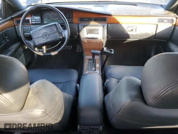 ✅ 1992 Cadillac Seville • VIN: 1G6KY53B3NU810317 • Lot: 46216475. Wystawiony na Copart z przebiegiem 112 679 mil. Bezpłatny archiwum sprzedaży aukcyjnych z USA i szczegółowy raport historii pojazdu na DreamBid. Zdjęcie 8.