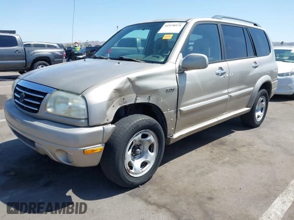 ✅ 2003 Suzuki XL7 Touring • VIN: JS3TX92V534103046 • Lot: 41978971. Listed on IAAI with 185,038 mi. Free auction sales archive from the USA and detailed vehicle history report at DreamBid. Image 2.