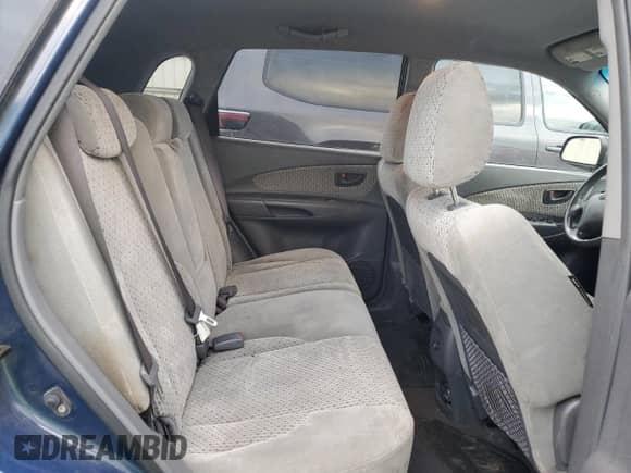 2005 Hyundai Tucson GLS z VIN KM8JN72D85U131798, wystawiony jako Copart lot #79274634 z przebiegiem 122 271 mil mil oraz Szkoda całkowita • Salvage title. Historia ofert i sprzedaży dostępna na DreamBid. Obrazek 10.