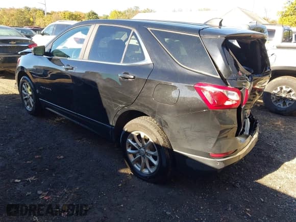 ✅ 2021 Chevrolet Equinox LT • VIN: 2GNAXJEVXM6151801 • Lot: 43462120. Listed on IAAI with 99,944 mi. Free auction sales archive from the USA and detailed vehicle history report at DreamBid. Image 3.
