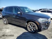 ✅ 2015 BMW X5 xDrive50i • VIN: 5UXKR6C54F0J77201 • Lot: 90848095. Listed on Copart with 131,670 mi. Free auction sales archive from the USA and detailed vehicle history report at DreamBid. Image 4.