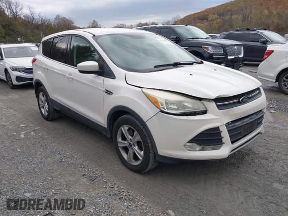 ✅ 2015 Ford Escape SE • VIN: 1FMCU9GX5FUB16820 • Lot: 43584827. Listed on IAAI with 131,101 mi. Free auction sales archive from the USA and detailed vehicle history report at DreamBid. Image 1.