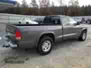 2002 Dodge Dakota z VIN 1B7GL12X22S589971, wystawiony jako Copart lot #79740174 z przebiegiem 183 718 mil mil oraz Czysty tytuł • Clean title. Historia ofert i sprzedaży dostępna na DreamBid. Obrazek 3.