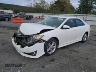 2014 Toyota Camry SE with VIN 4T1BF1FK3EU381067, listed as a Copart auction lot 87383475 with Not provided miles and Salvage title. Bid and sale history available at DreamBid. Image 1.