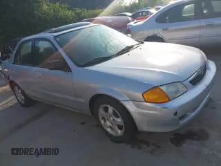 ✅ 1999 Mazda Protege ES • VIN: JM1BJ2212X0194256 • Lot: 42452060. Wystawiony na IAAI z przebiegiem 208 002 mil. Bezpłatny archiwum sprzedaży aukcyjnych z USA i szczegółowy raport historii pojazdu na DreamBid. Zdjęcie 1.