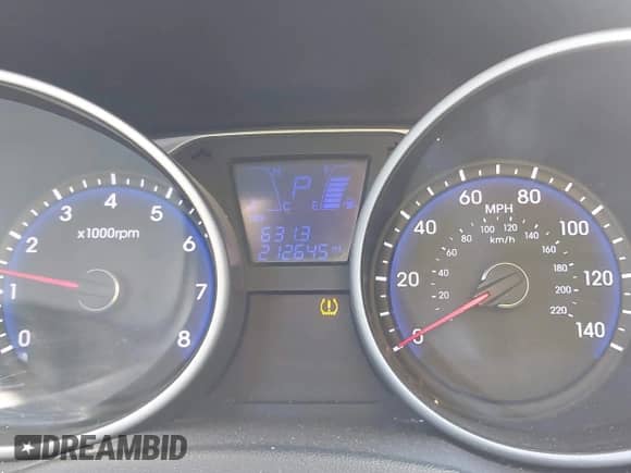 2013 Hyundai Tucson GLS z VIN KM8JU3AC4DU653198, wystawiony jako IAAI lot #42942159 z przebiegiem 212 645 mil mil oraz . Historia ofert i sprzedaży dostępna na DreamBid. Obrazek 7.