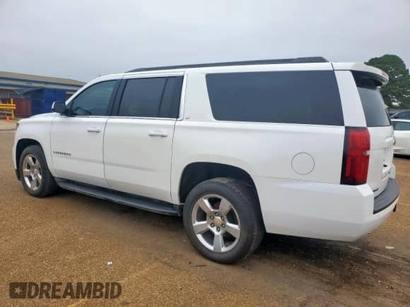 2016 Chevrolet Suburban LT z VIN 1GNSCHKC3GR103948, wystawiony jako Copart lot #90447755 z przebiegiem 189 409 mil mil oraz Czysty tytuł • Clean title. Historia ofert i sprzedaży dostępna na DreamBid. Obrazek 2.