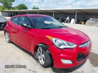 ✅ 2014 Hyundai Veloster • VIN: KMHTC6AD7EU189136 • Lot: 42567617. Wystawiony na IAAI z przebiegiem 137 688 mil. Bezpłatny archiwum sprzedaży aukcyjnych z USA i szczegółowy raport historii pojazdu na DreamBid. Zdjęcie 1.