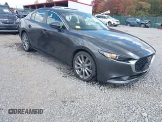 ✅ 2021 Mazda 3 Select • VIN: 3MZBPBBM0MM205107 • Lot: 43268596. Wystawiony na IAAI z przebiegiem 54 766 mil. Bezpłatny archiwum sprzedaży aukcyjnych z USA i szczegółowy raport historii pojazdu na DreamBid. Zdjęcie 1.
