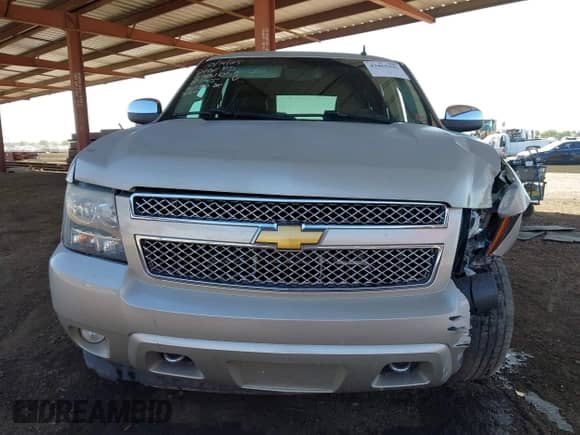 2013 Chevrolet Tahoe LTZ z VIN 1GNSKCE02DR360795, wystawiony jako IAAI lot #43465393 z przebiegiem 215 409 mil mil oraz . Historia ofert i sprzedaży dostępna na DreamBid. Obrazek 12.