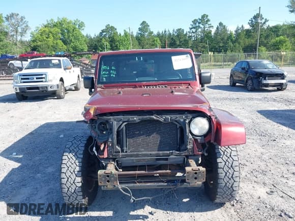 ✅ 2007 Jeep Wrangler Unlimited Sahara • VIN: 1J8GA59187L211825 • Lot: 42313099. Listed on IAAI with 107,554 mi. Free auction sales archive from the USA and detailed vehicle history report at DreamBid. Image 13.