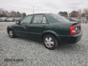 ✅ 2001 Mazda Protege DX • VIN: JM1BJ222010447414 • Лот: 81344584. Опубликован ранее на Copart с пробегом 195 931 миль. Бесплатный доступ к архиву аукционных продаж из США и подробный отчёт об истории автомобиля на DreamBid. Изображение 2.