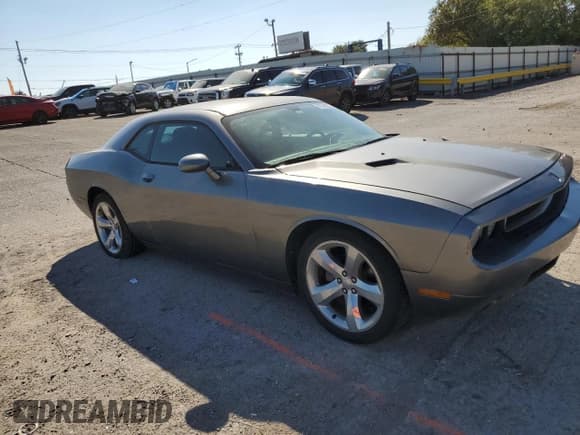 ✅ 2012 Dodge Challenger SXT • VIN: 2C3CDYAG9CH268724 • Лот: 82285255. Опубликован ранее на Copart с пробегом 164 460 миль. Бесплатный доступ к архиву аукционных продаж из США и подробный отчёт об истории автомобиля на DreamBid. Изображение 4.