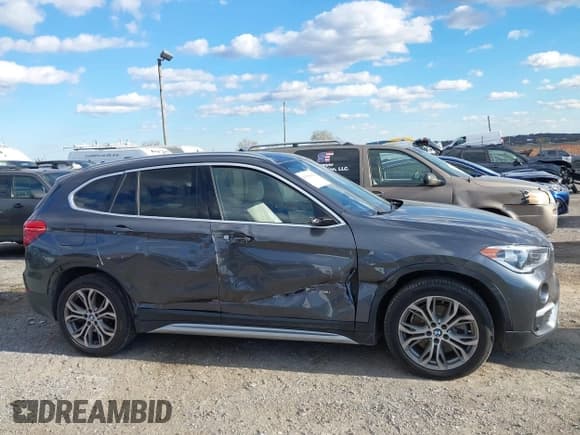 ✅ 2017 BMW X1 xDrive28i • VIN: WBXHT3Z36H4A58469 • Лот: 43559420. Опубликован ранее на IAAI с пробегом 76 569 миль. Бесплатный доступ к архиву аукционных продаж из США и подробный отчёт об истории автомобиля на DreamBid. Изображение 13.