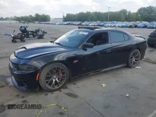2016 Dodge Charger SRT 392 with VIN 2C3CDXEJ6GH204999, listed as a Copart auction lot 68998795 with 100,394 mi miles and Salvage title. Bid and sale history available at DreamBid. Image 1.