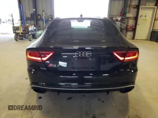 ✅ 2014 Audi RS 7 Prestige • VIN: WUAW2BFC6EN903378 • Лот: 67889104. Опубликован ранее на Copart с пробегом 98 546 миль. Бесплатный доступ к архиву аукционных продаж из США и подробный отчёт об истории автомобиля на DreamBid. Изображение 6.