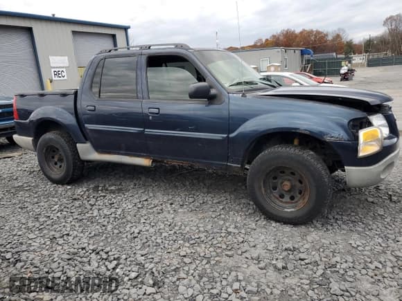 ✅ 2003 Ford Explorer Sport Trac XLS • VIN: 1FMZU77E13UB07895 • Lot: 90637575. Listed on Copart with 203,918 mi. Free auction sales archive from the USA and detailed vehicle history report at DreamBid. Image 4.