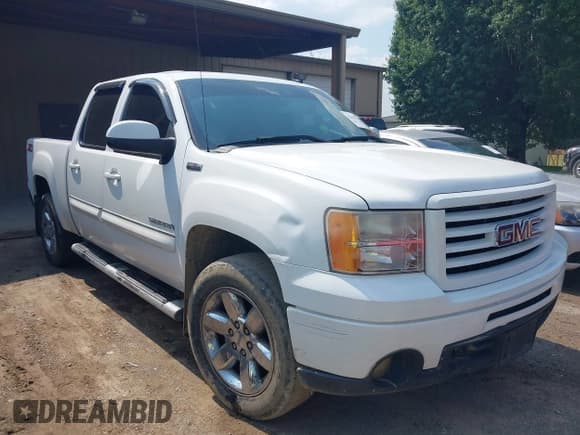 ✅ 2012 GMC Sierra 1500 SLT • VIN: 3GTP2WE71CG170921 • Lot: 42411614. Listed on IAAI with 169,738 mi. Free auction sales archive from the USA and detailed vehicle history report at DreamBid. Image 1.