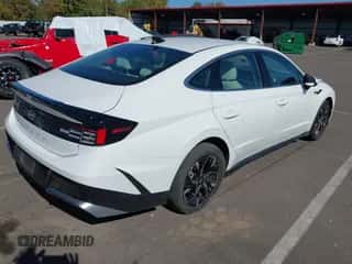 2025 Hyundai Sonata SEL with VIN KMHL64JA7SA486406, listed as a IAAI auction lot 43503569 with 15,107 mi miles and . Bid and sale history available at DreamBid. Image 4.