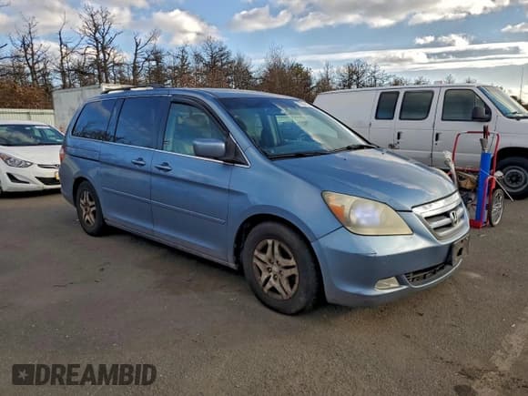 ✅ 2006 Honda Odyssey EX-L • VIN: 5FNRL38776B070297 • Лот: 95570655. Опубликован ранее на Copart с пробегом 124 763 миль. Бесплатный доступ к архиву аукционных продаж из США и подробный отчёт об истории автомобиля на DreamBid. Изображение 4.
