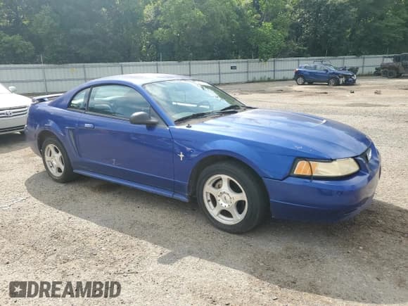 ✅ 2003 Ford Mustang Standard • VIN: 1FAFP40493F373920 • Lot: 57312595. Listed on Copart with 164,986 mi. Free auction sales archive from the USA and detailed vehicle history report at DreamBid. Image 4.