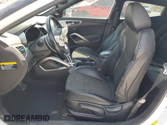 2016 Hyundai Veloster с VIN KMHTC6AD6GU288923, выставлен на аукционе Copart как лот 66437694 с пробегом 75 040 миль миль и Списание • Salvage title. История ставок и продаж доступна на DreamBid. Изображение 7.