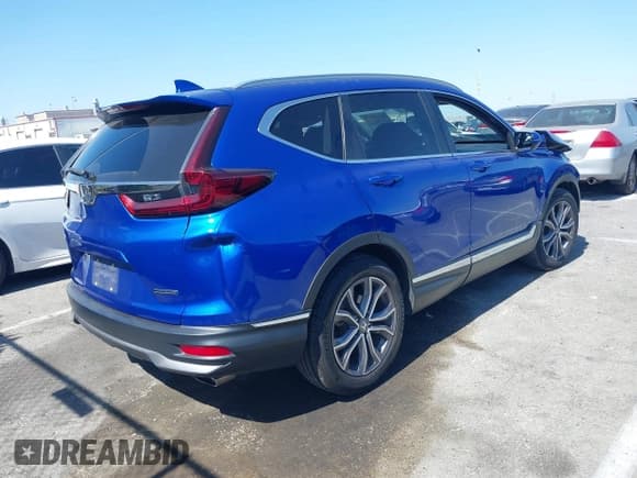 ✅ 2020 Honda CR-V Touring • VIN: 7FARW1H97LE011473 • Lot: 42368050. Listed on IAAI with 84,425 mi. Free auction sales archive from the USA and detailed vehicle history report at DreamBid. Image 4.