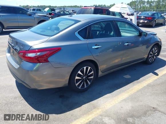 ✅ 2018 Nissan Altima SR • VIN: 1N4AL3APXJC169943 • Lot: 42318558. Listed on IAAI with 143,950 mi. Free auction sales archive from the USA and detailed vehicle history report at DreamBid. Image 4.